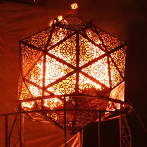 The metal urn rests on a stand and the messages placed inside it are burnt.